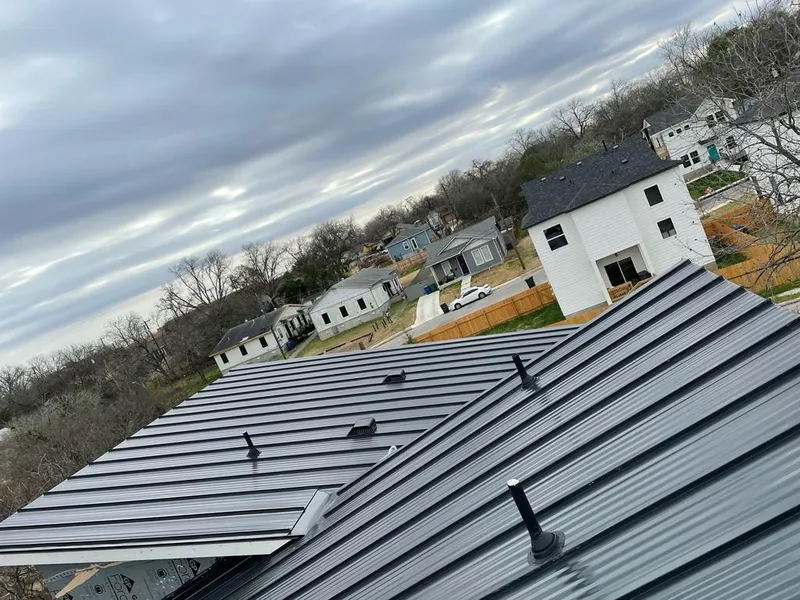 Standing seam metal roof panels with vents for Skylight Repair in Shaler